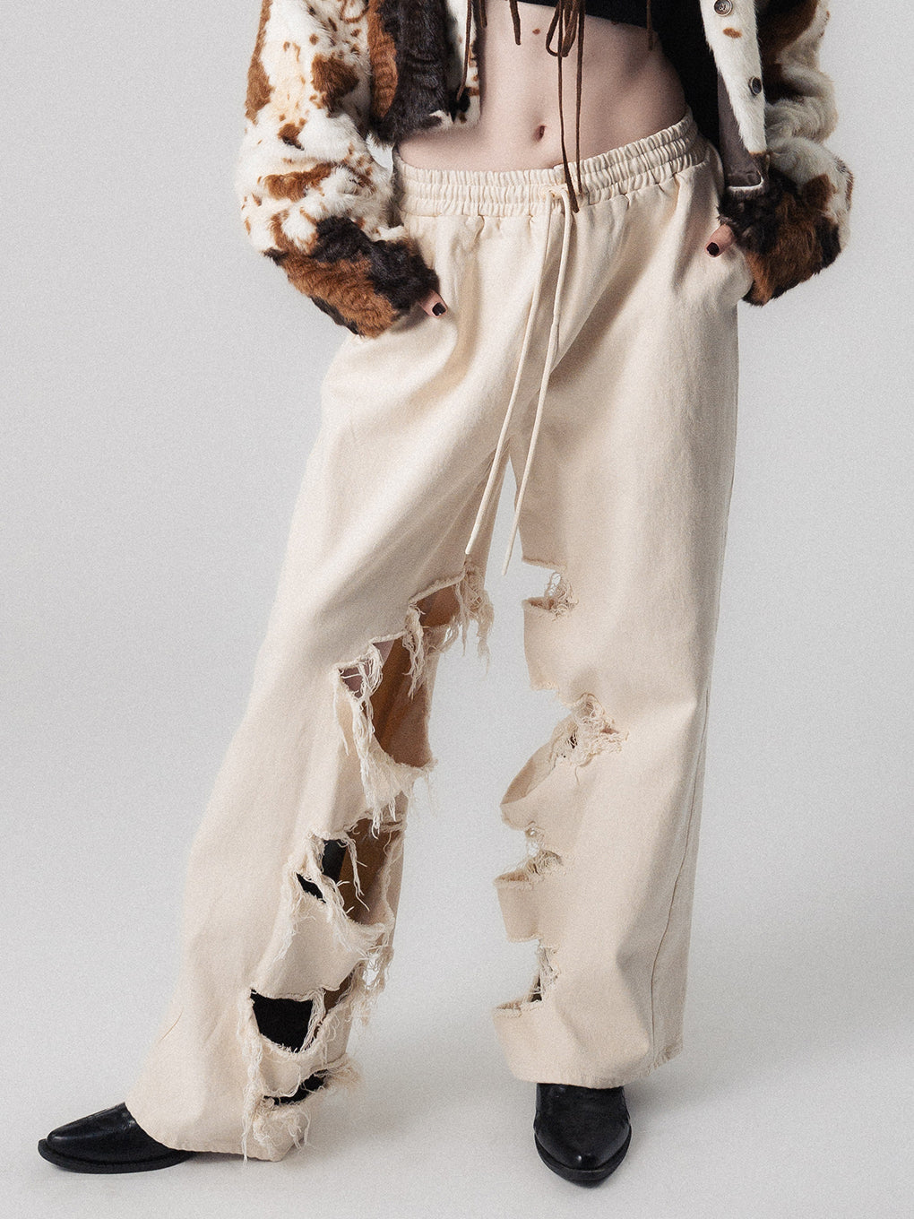 INSIDE RIPPED HOLE PANTS